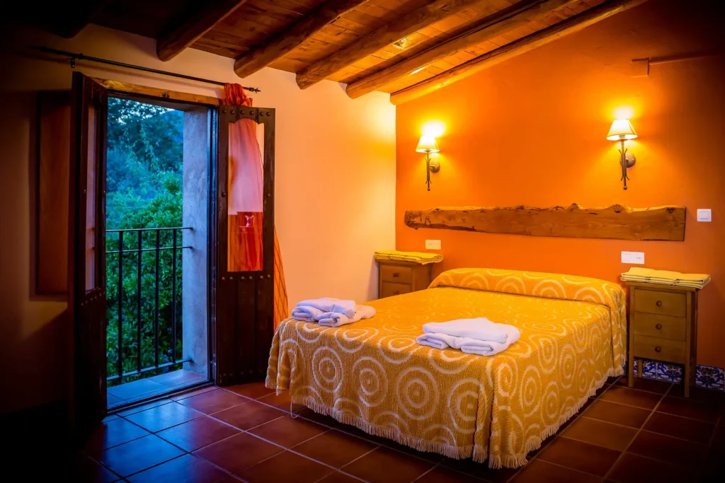 Habitación de matrimonio con balcón